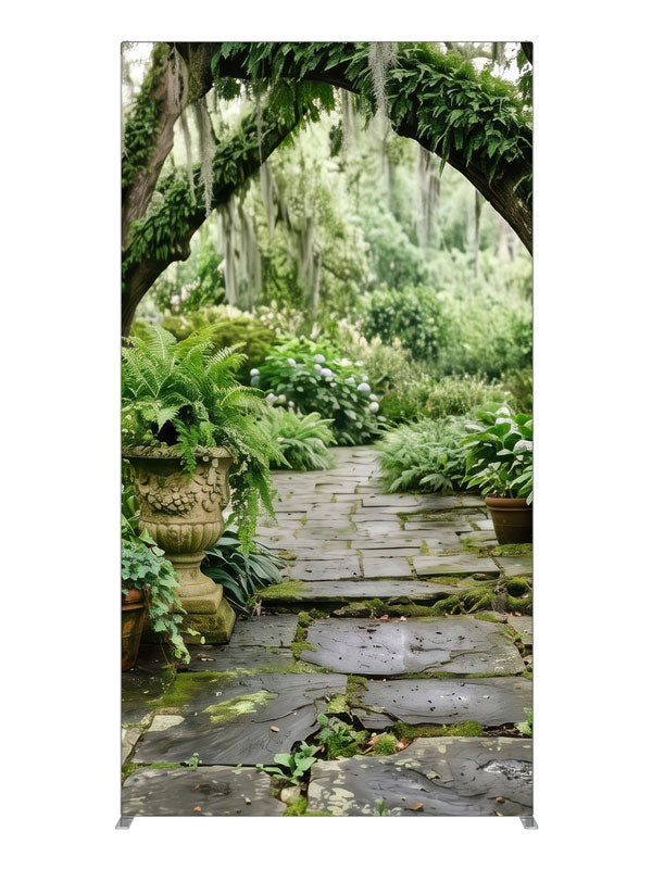 A mossy stone garden path beneath Spanish-moss live oaks with ferns and stone urns, 4ft photography backdrop panel for Denny StudioEdge silicone edge frame