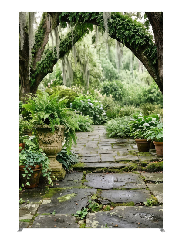 A mossy stone garden path beneath Spanish-moss live oaks with ferns and stone urns, 5ft photography backdrop panel for Denny StudioEdge silicone edge frame