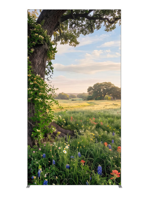Spreading live oak wrapped in honeysuckle vine above a meadow of bluebonnets and red paintbrush wildflowers, 4ft photography backdrop panel for Denny StudioEdge silicone edge frame