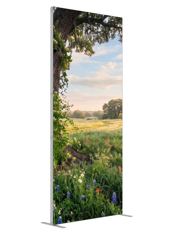Spreading live oak wrapped in honeysuckle vine above a meadow of bluebonnets and red paintbrush wildflowers, 3ft photography backdrop panel for Denny StudioEdge silicone edge frame, angled view