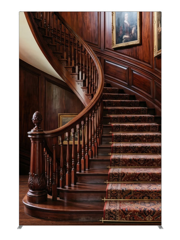 A mahogany curved staircase with turned balusters, a patterned runner and paneled walls hung with portraits, 5ft photography backdrop panel for Denny StudioEdge silicone edge frame