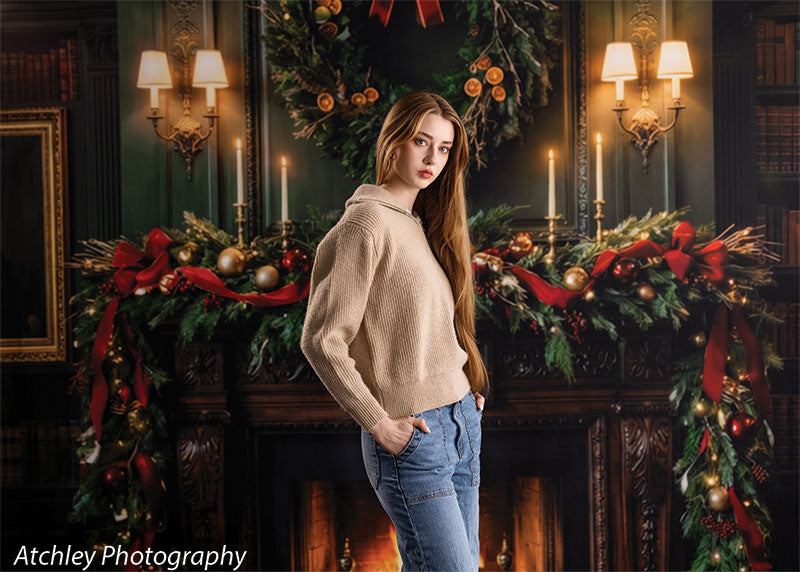 Manor Hearth dark wood fireplace with Christmas wreath photography backdrop shown with a senior girl standing by the garland-draped fireplace in a wide view CP-8885