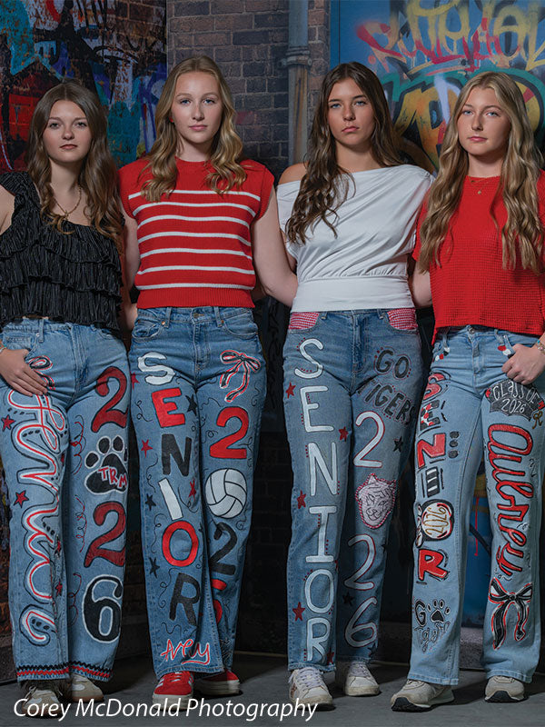 Marlowe Brick Wall Graffiti, photography backdrop panel for Denny StudioEdge silicone edge frame, shown with four senior girls in painted senior jeans standing together, half-length SECP-8863