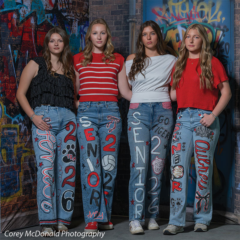 Marlowe Brick Wall Graffiti, photography backdrop panel for Denny StudioEdge silicone edge frame, shown with four senior girls in painted senior jeans posed together against the graffiti wall SECP-8863