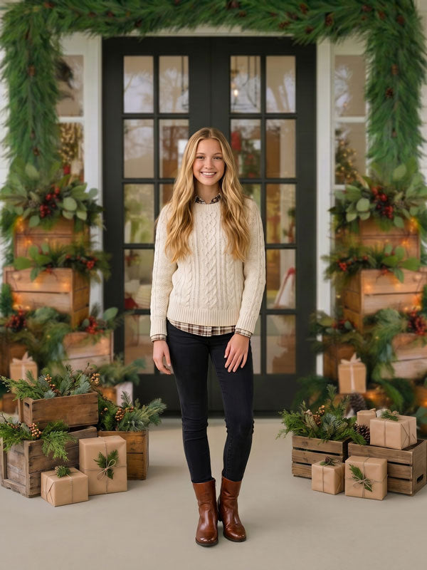 Midnight Porch black French double doors with Christmas garland photography backdrop shown with a teen girl in a cream sweater standing in the entryway CP-8924