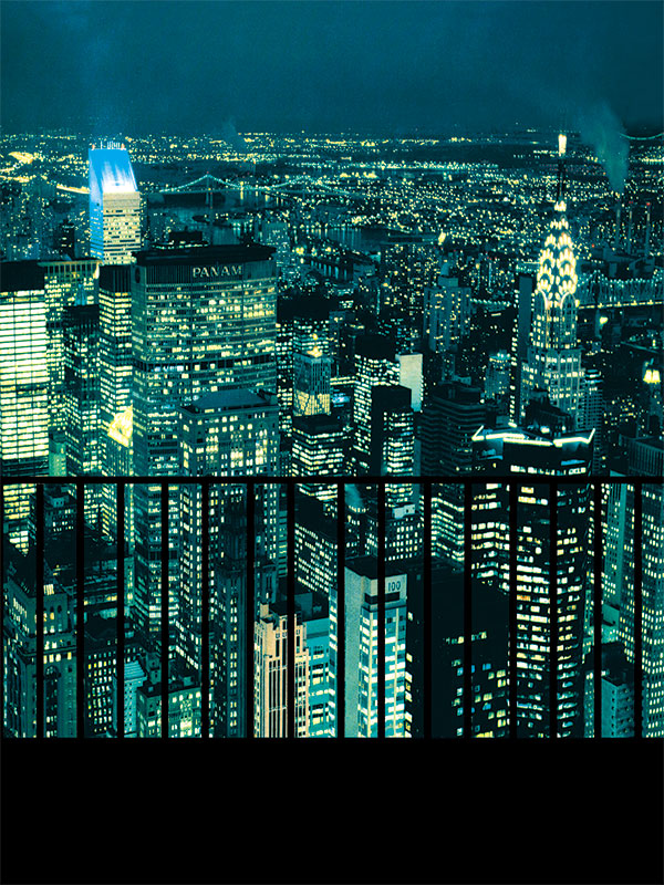Nighttime city skyline backdrop featuring iconic New York skyscrapers and a silhouetted balcony railing, ideal for urban-themed portrait sessions.