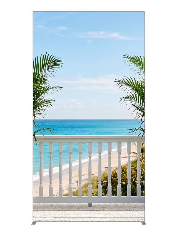 A white seaside deck with a spindle railing and porcelain palm planters over turquoise ocean, 4ft photography backdrop panel for Denny StudioEdge silicone edge frame