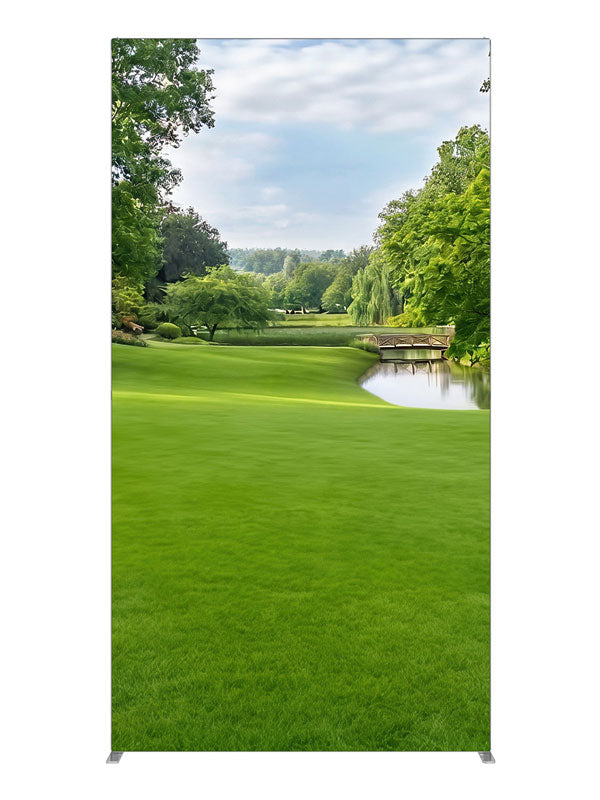 A manicured park with a pond, low wooden footbridge and weeping willows, 4ft photography backdrop panel for Denny StudioEdge silicone edge frame
