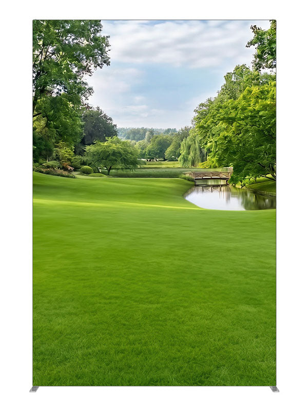 A manicured park with a pond, low wooden footbridge and weeping willows, 5ft photography backdrop panel for Denny StudioEdge silicone edge frame