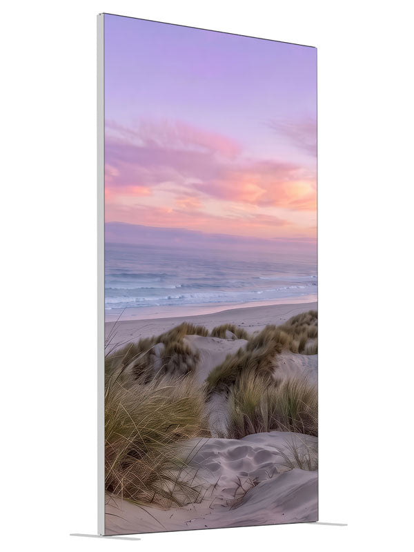 Grassy sand dunes and calm ocean under a soft pastel sunset sky, 4ft photography backdrop panel for Denny StudioEdge silicone edge frame, angled view