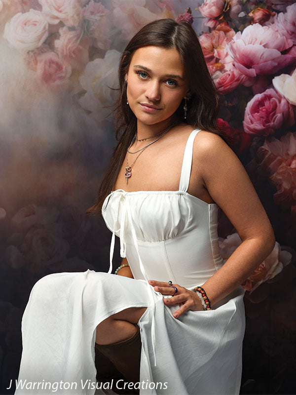 Peonies and roses photography backdrop shown with a young woman in a white dress seated with a hand on her hip in an editorial pose CP-8491