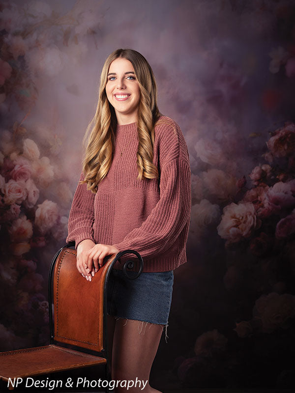 Peonies and roses photography backdrop shown with a senior girl in a mauve sweater standing beside a wood chair CP-8491