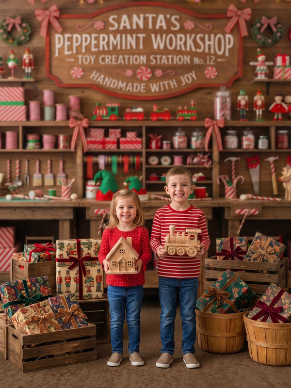 Peppermint Hollow Santa's peppermint workshop with toy shelves and candy jars photography backdrop shown with two children holding handmade wooden toys CP-8912