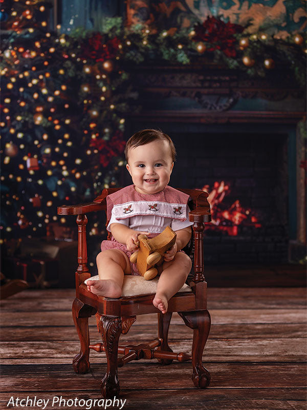 Rustic holiday fireplace scene with festive decor, designed for portrait photography.