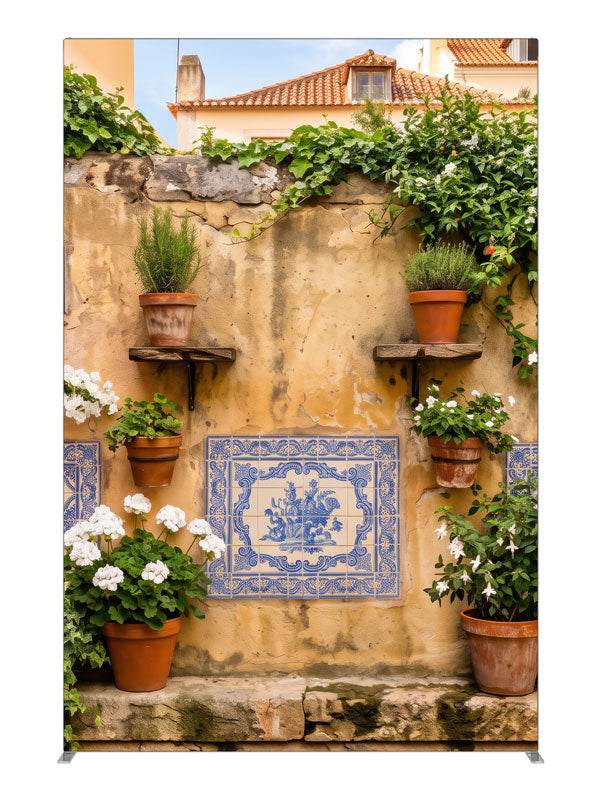A warm ochre plaster wall with blue-and-white Portuguese tiles and potted geraniums, 5ft photography backdrop panel for Denny StudioEdge silicone edge frame