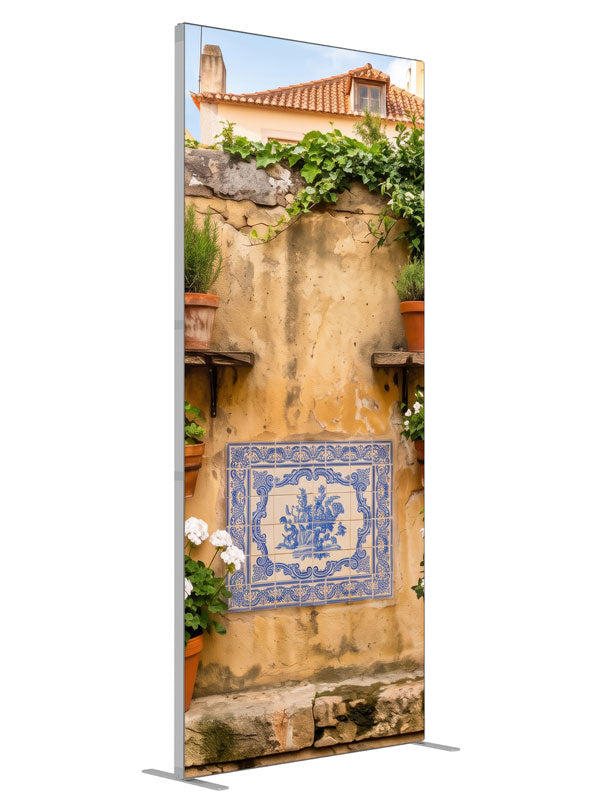 A warm ochre plaster wall with blue-and-white Portuguese tiles and potted geraniums, 3ft photography backdrop panel for Denny StudioEdge silicone edge frame, angled view