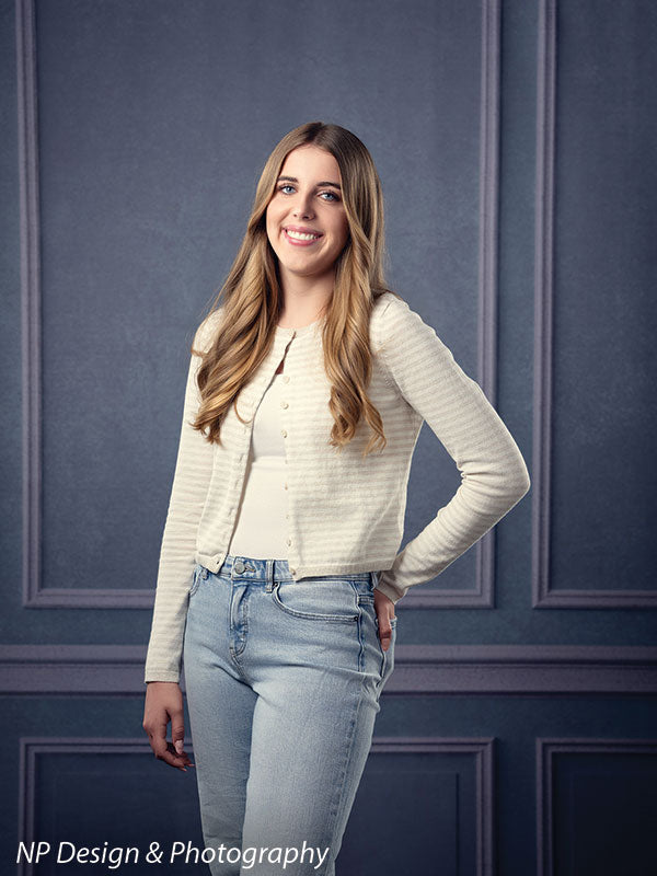 Princess grace photography backdrop shown with standing with a hand on her hip in front of the paneled wall CP-7810