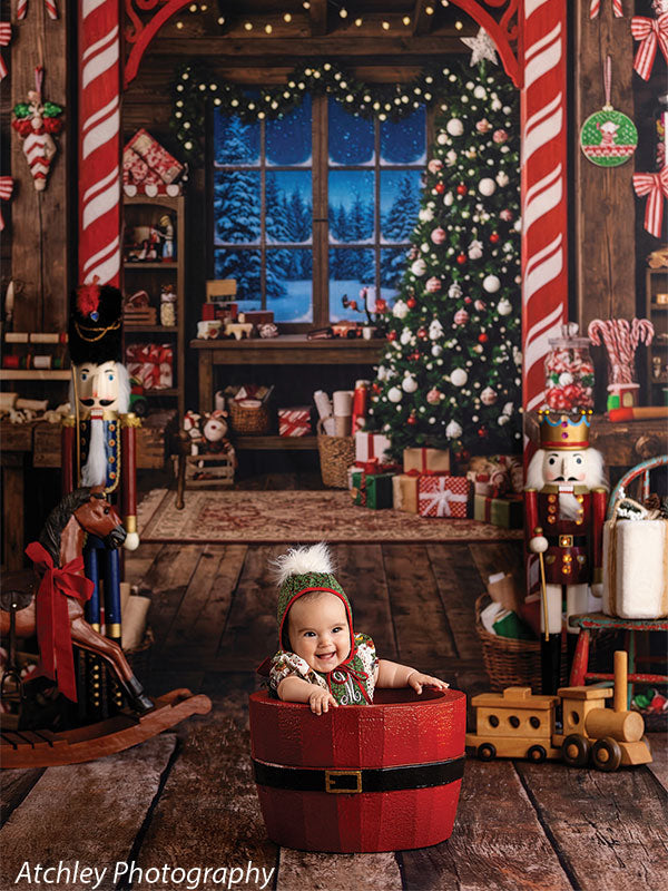 Reclaimed wood photography floor drop shown with a baby leaning on a red Santa bucket on the reclaimed wood floor FD-4070