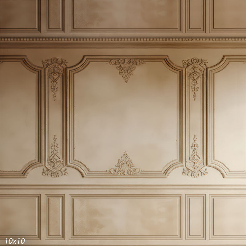 Symmetrical French wall design with floral motifs and raised moldings, softly lit to highlight texture.