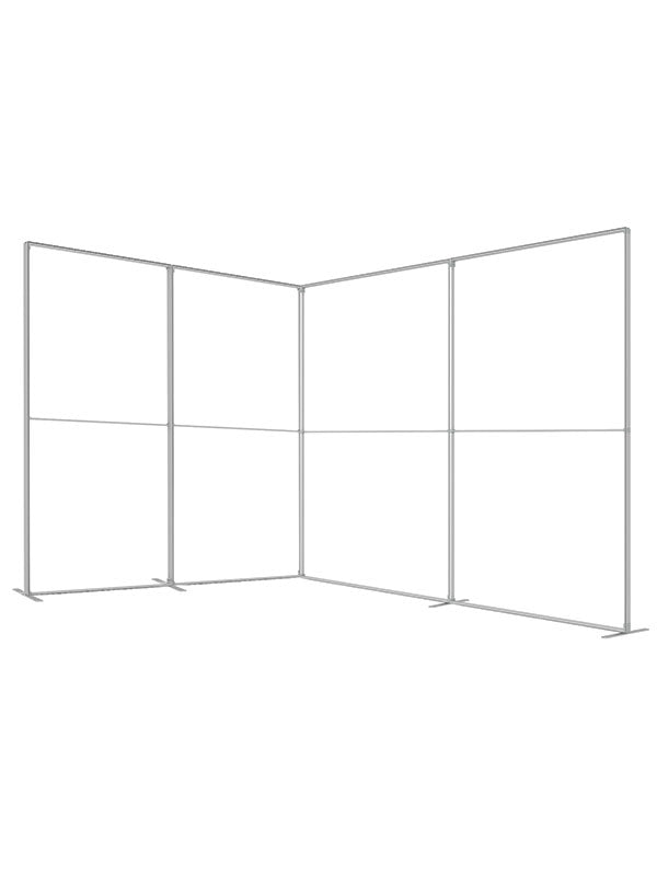 Multiple frame panels joined into an L-shaped room configuration, viewed from an elevated angle, in lightweight silver aluminum — part of the Denny StudioEdge modular backdrop frame system.