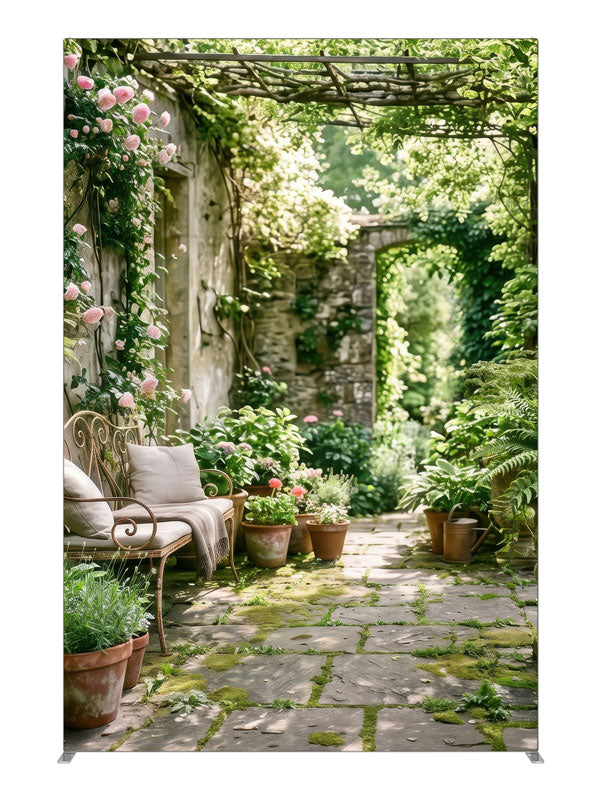 An English garden courtyard with a vine-draped pergola, climbing roses and a flagstone path to an arched doorway, 5ft photography backdrop panel for Denny StudioEdge silicone edge frame