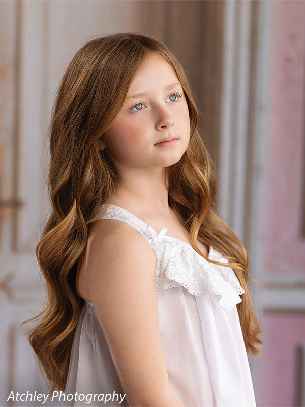 Rose Parlor distressed pink French double doors photography backdrop shown with a young girl in a white slip dress gazing upward in a close portrait CP-8793