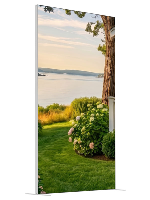 White cottage garden with blooming hydrangeas overlooking a calm summer bay, 4ft photography backdrop panel for Denny StudioEdge silicone edge frame, angled view