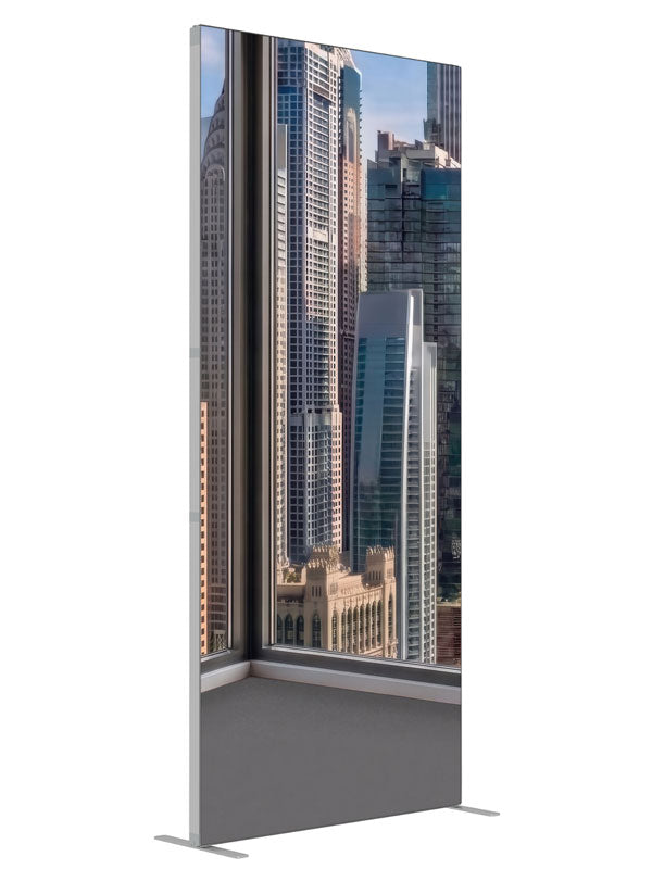 An empty modern room corner with windows over a sunlit daytime skyscraper skyline, 3ft photography backdrop panel for Denny StudioEdge silicone edge frame, angled view