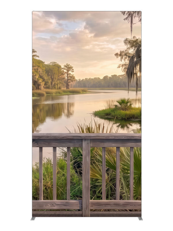 Weathered railing over a southern bayou with moss-draped cypress at peach sunset, 4ft photography backdrop panel for Denny StudioEdge silicone edge frame