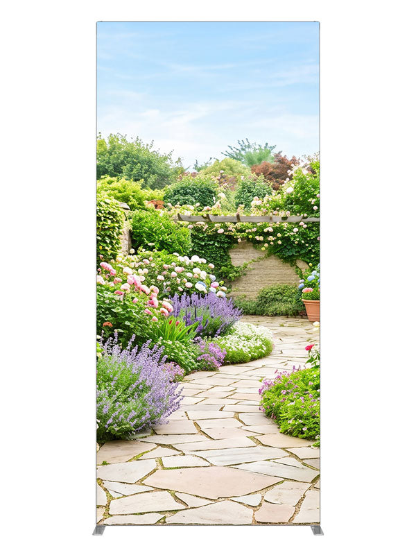 A flagstone path through a dense spring garden of hydrangeas, lavender and roses with a stone wall and pergola, 3ft photography backdrop panel for Denny StudioEdge silicone edge frame