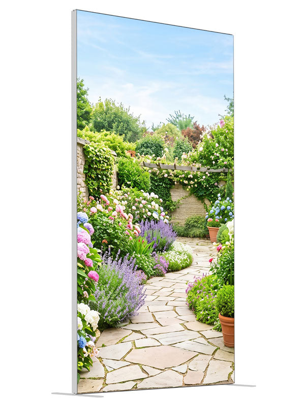 A flagstone path through a dense spring garden of hydrangeas, lavender and roses with a stone wall and pergola, 4ft photography backdrop panel for Denny StudioEdge silicone edge frame, angled view