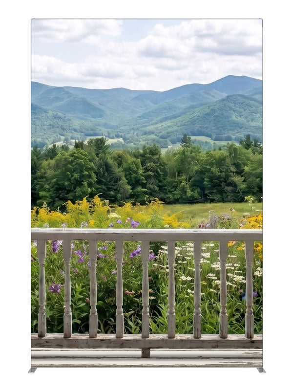White porch railing above a summer mountain meadow of purple and yellow wildflowers, 5ft photography backdrop panel for Denny StudioEdge silicone edge frame
