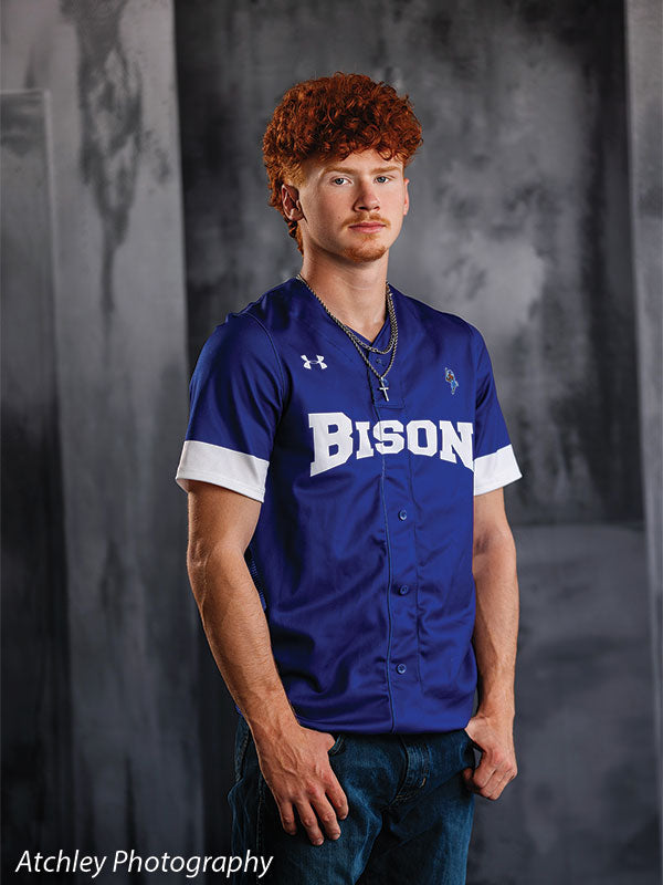 Textured Gray multi-panel photography backdrop shown with a senior athlete in a blue Bison baseball jersey standing CP-8817
