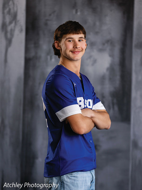 Textured Gray multi-panel photography backdrop shown with a senior athlete in a blue Bison jersey with arms crossed CP-8817