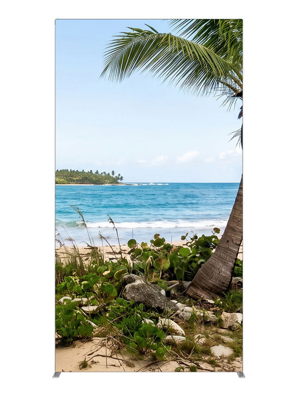A tropical beach with a leaning coconut palm over white sand, turquoise surf and a distant point, 4ft photography backdrop panel for Denny StudioEdge silicone edge frame
