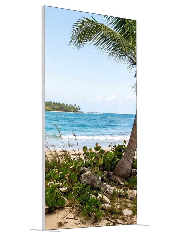 A tropical beach with a leaning coconut palm over white sand, turquoise surf and a distant point, 4ft photography backdrop panel for Denny StudioEdge silicone edge frame, angled view