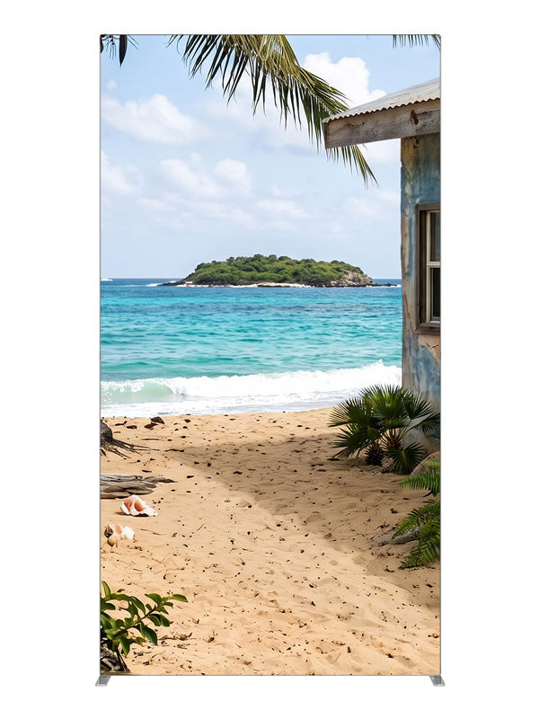 A weathered beach shack beside white sand, a leaning palm and a turquoise bay with an offshore islet, 4ft photography backdrop panel for Denny StudioEdge silicone edge frame