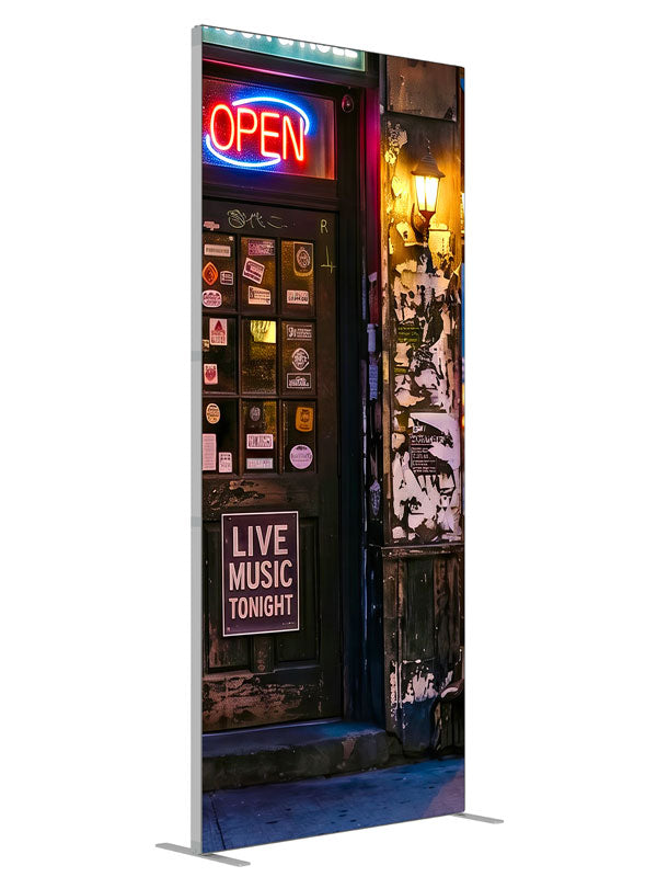 Gritty neon-lit city bar corner at night with live-music signage and a sticker-covered door, 3ft photography backdrop panel for Denny StudioEdge silicone edge frame, angled view