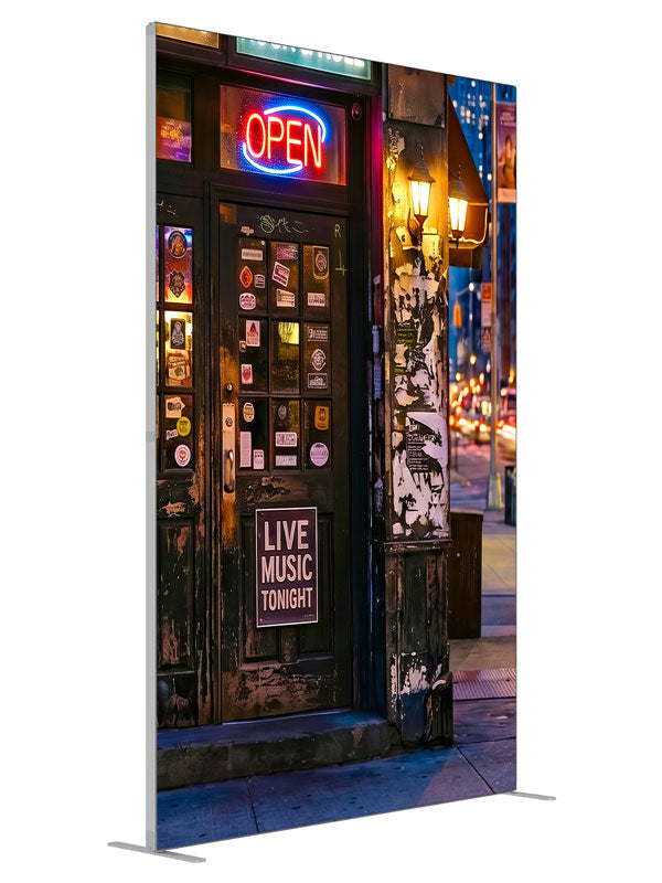 Gritty neon-lit city bar corner at night with live-music signage and a sticker-covered door, 5ft photography backdrop panel for Denny StudioEdge silicone edge frame, angled view