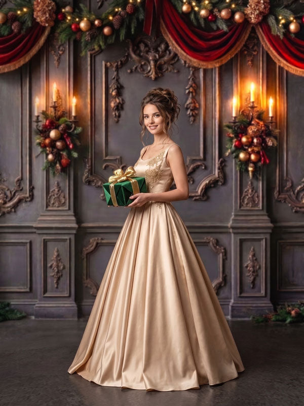 Velvet Swag ornate gray paneled wall with red velvet draping photography backdrop shown with a woman in a gold ballgown holding a green wrapped gift CP-8899
