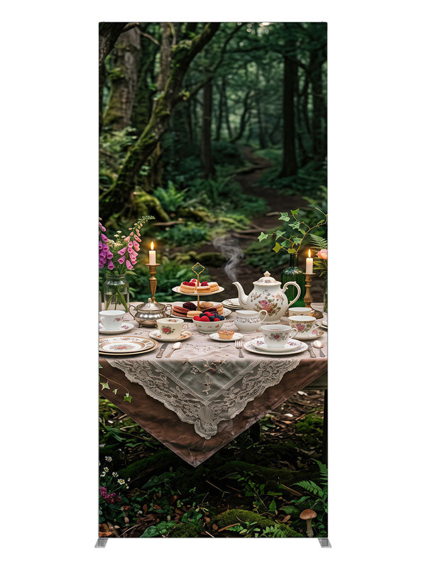 A storybook tea-party table with florals and candlelight set in a mossy enchanted forest with lanterns, 3ft photography backdrop panel for Denny StudioEdge silicone edge frame
