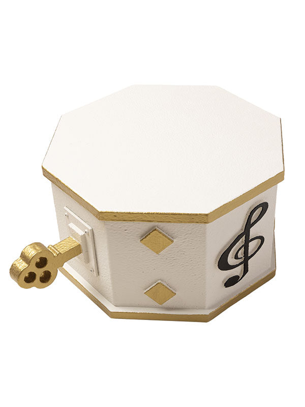 Angled top-down view of the white and gold wind-up music box prop with treble clef detail, ideal for styled sets and storytelling portrait sessions.