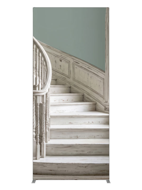 A distressed whitewashed curved staircase with sage walls and an arched window onto sunlit palms, 3ft photography backdrop panel for Denny StudioEdge silicone edge frame