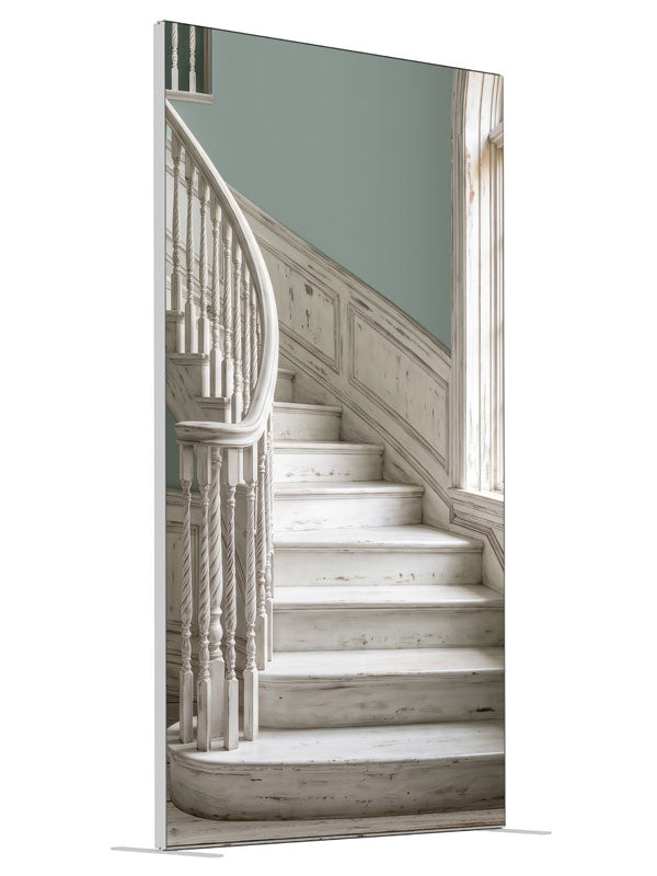 A distressed whitewashed curved staircase with sage walls and an arched window onto sunlit palms, 4ft photography backdrop panel for Denny StudioEdge silicone edge frame, angled view