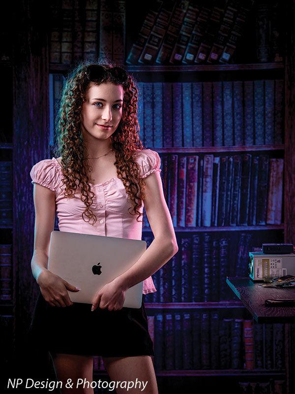 Worn volumes book shelf photography backdrop shown with a senior girl holding a laptop under her arm CP-7317