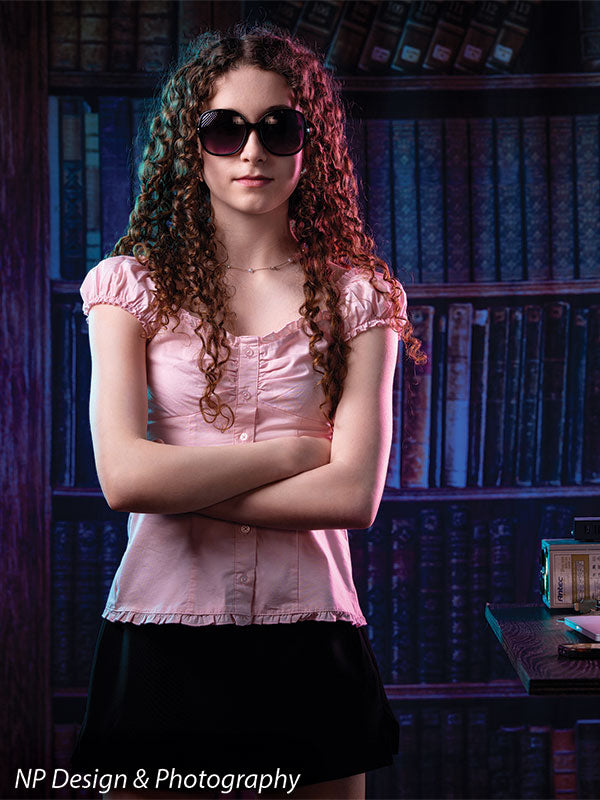 Worn volumes book shelf photography backdrop shown with a senior girl in sunglasses with arms crossed in a vertical portrait CP-7317