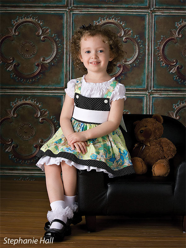 Square tile backdrop with antique copper tones and natural oxidation.