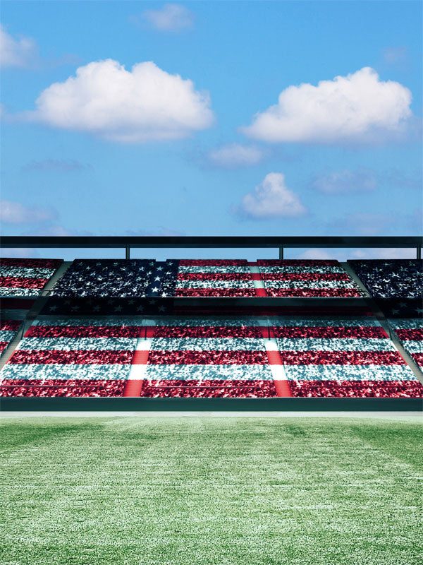 All-American Stadium Photography Backdrop - Photography backdrop of a stadium with American flag-themed seats and a blue sky with clouds.