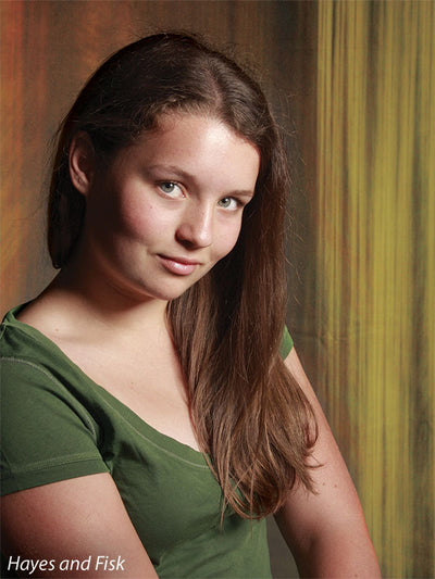 Amber and cream brush backdrop with flowing, natural vertical lines.