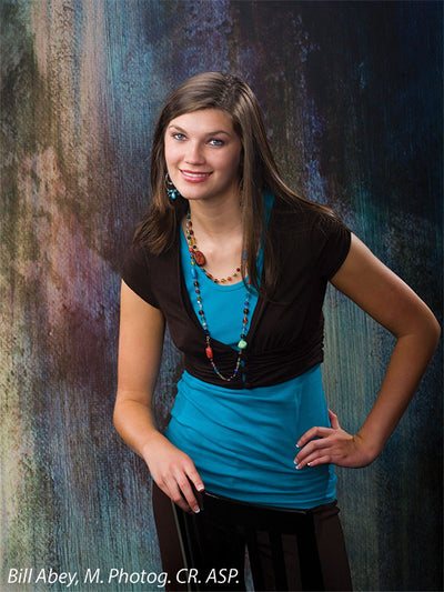 Backdrop with muted plum and glacier tones ideal for emotive portraits.